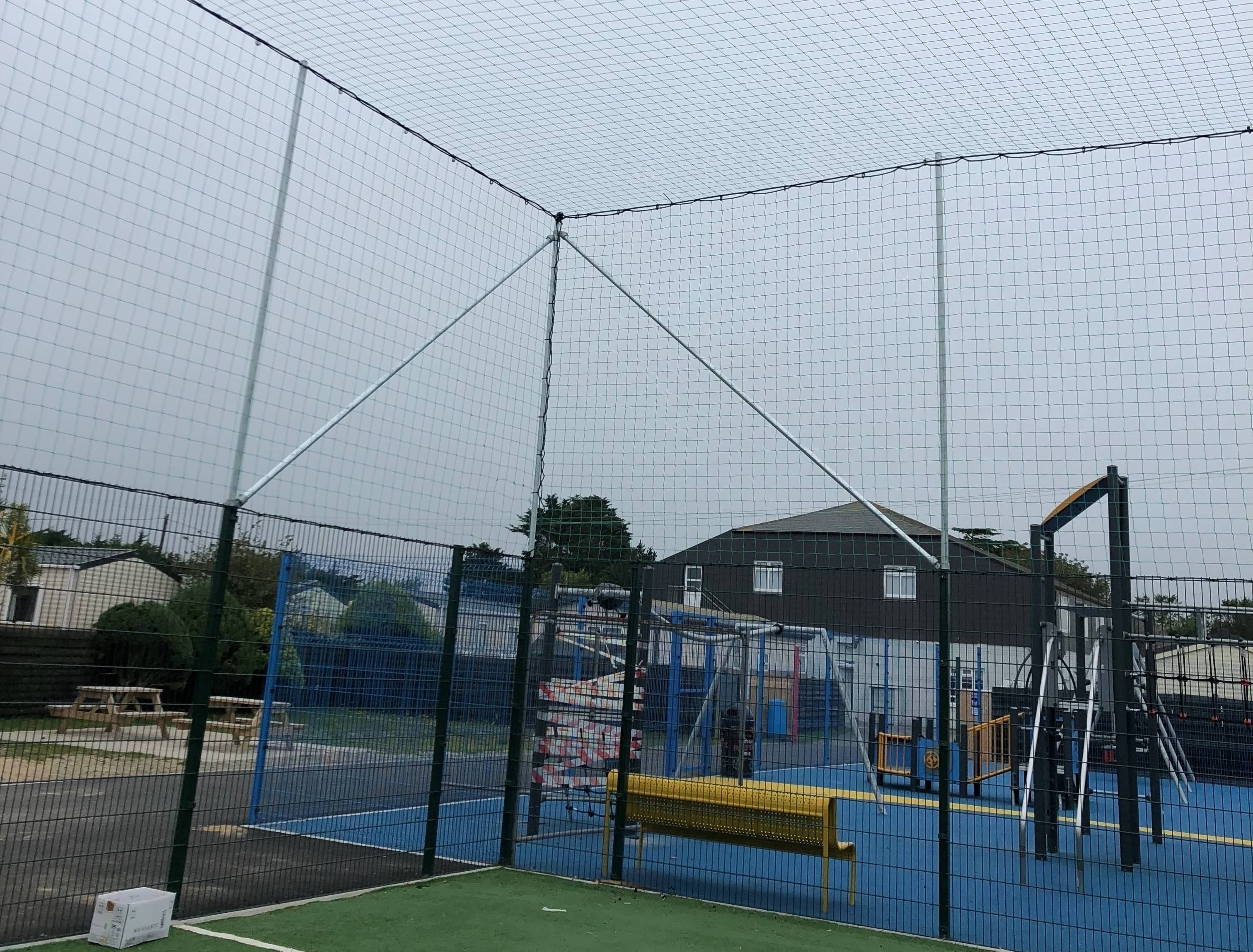 Enclosure net around soccer astro turf pitch